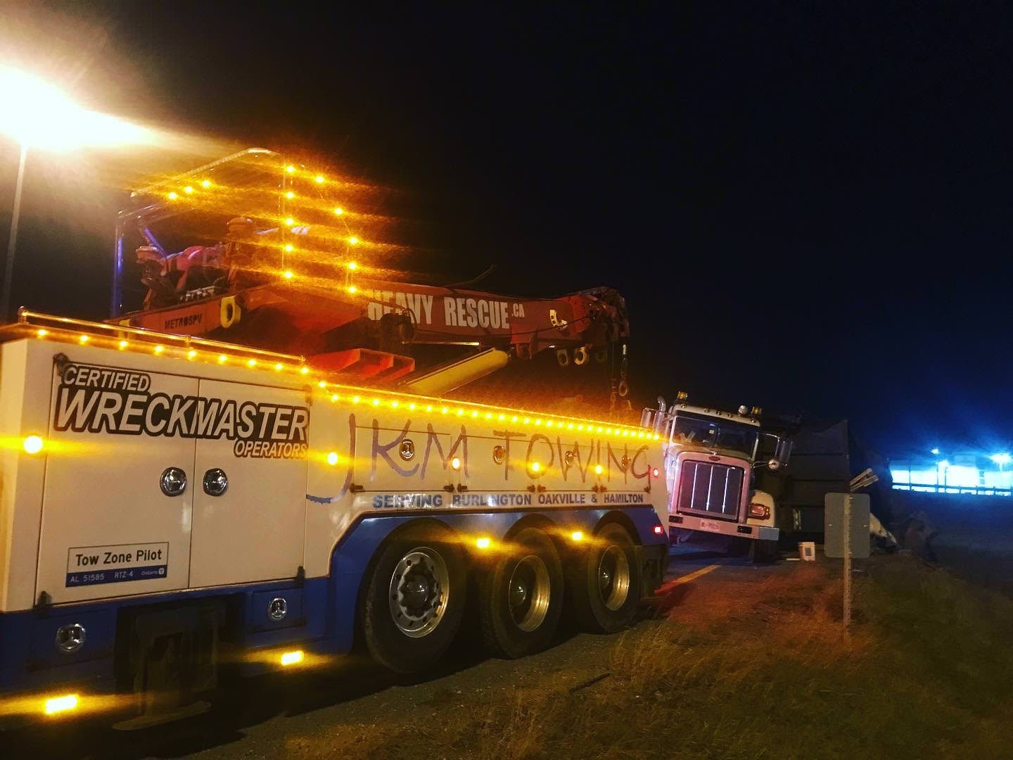 JKM Heavy Rescue WreckMaster truck at night